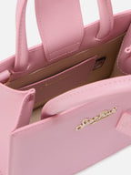 Borsa Shop mini strutturata in pelle liscia rosa con targhetta metallica