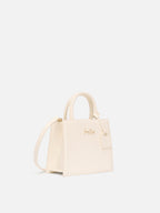 Borsa Shop mini strutturata in pelle liscia bianca con targhetta metallica