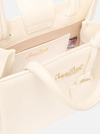 Borsa Shop mini strutturata in pelle liscia bianca con targhetta metallica