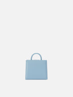 Borsa Shop micro strutturata in pelle liscia azzurra con targhetta metallica