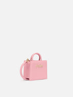 Borsa Shop micro strutturata in pelle liscia rosa con targhetta metallica