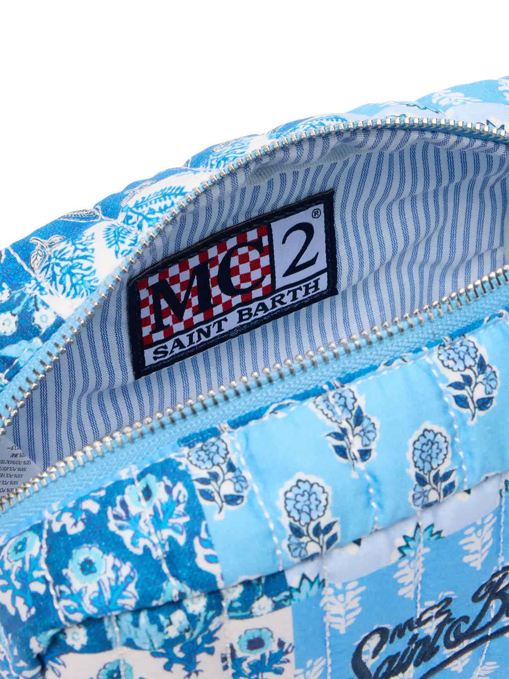 Soft Pouch trapuntata con fiori blu