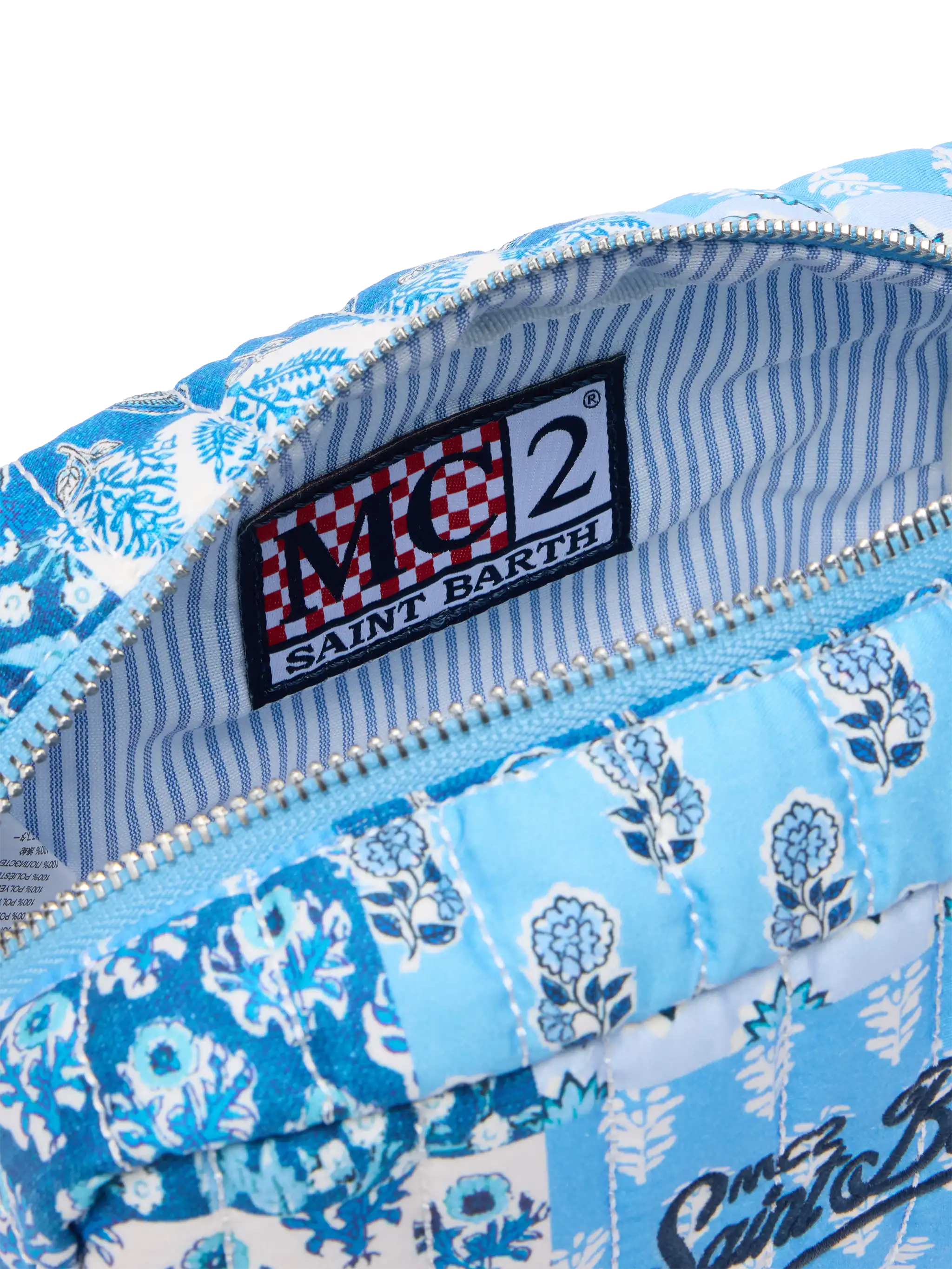 Soft Pouch trapuntata con fiori blu